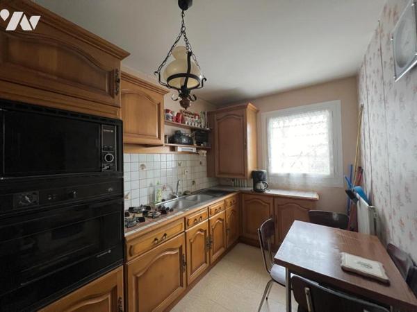 APPARTEMENT AVEC GARAGE AU CALME - 1ER ETAGE