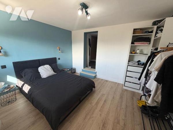Située dans les hauteurs de Culoz, cette maison individuelle bénéficie d'un agencement fonction...