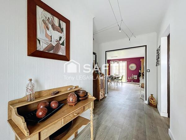 Plain-pied composé de 4 chambres dont une suite parentale