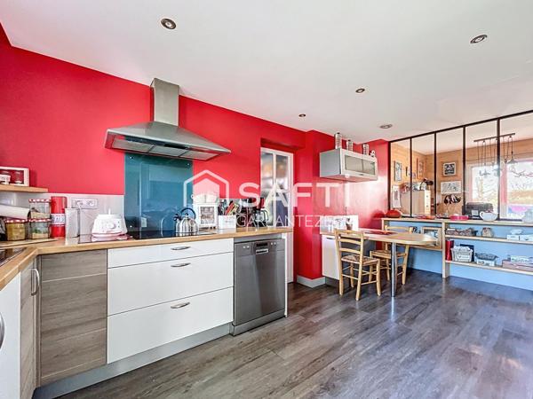 Plain-pied composé de 4 chambres dont une suite parentale