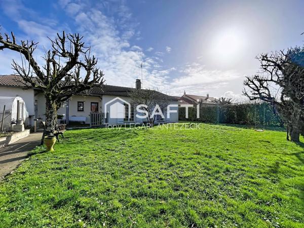 Plain-pied composé de 4 chambres dont une suite parentale