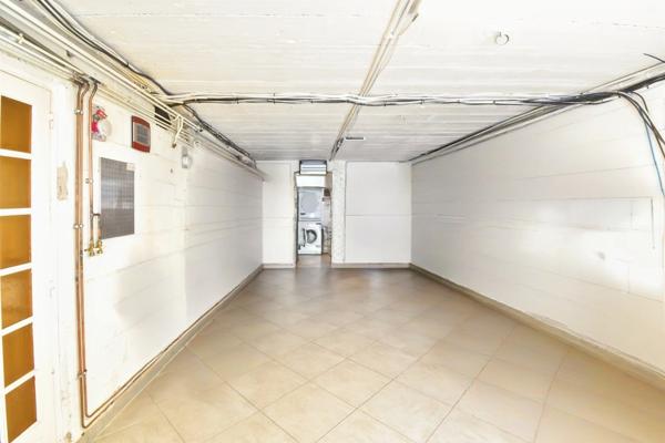 Maison 5 pièces avec véranda - sous-sol total dont grand garage de 25m² - dépendance dans le  jardin - Epinay sur Orge (91)