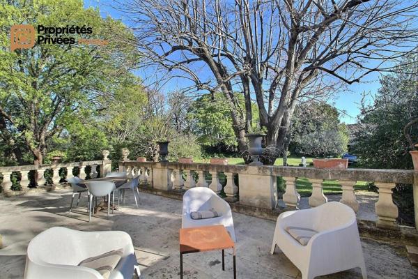 UZES Propriété d'exception en pierre au coeur d'Uzès, dans un écrin de verdure de 2 195 m², offrant 423 m² habitables avec 6 chambres