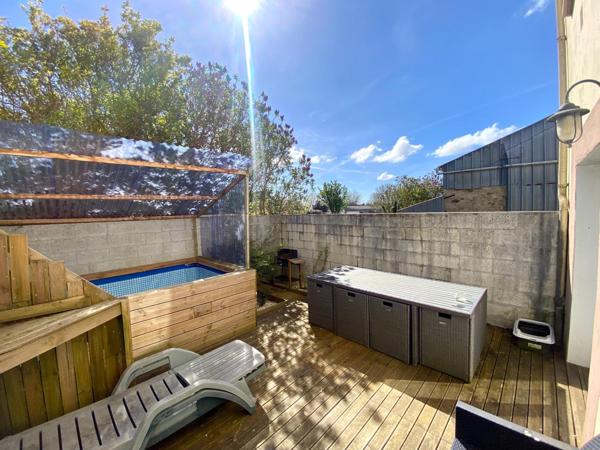 Maison de ville : 5 chambres, garage, terrasse ensoleillée. Opportunité d'investissement!