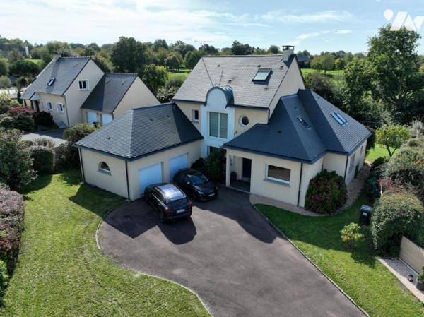 Maison familiale de 6 chambres - 2008 - Equipements modernes - Jardin clos - Garage double