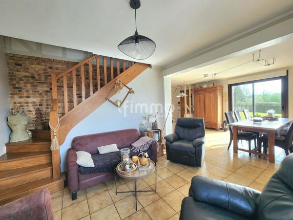 Maison traditionnelle avec étang