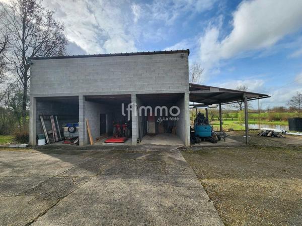 Maison traditionnelle avec étang