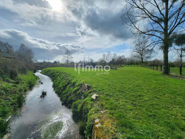 Maison traditionnelle avec étang