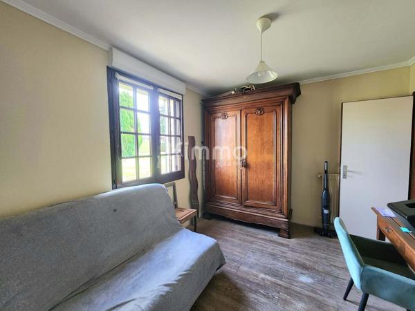 Maison traditionnelle avec étang