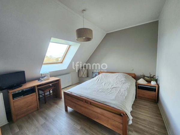 Maison traditionnelle avec étang