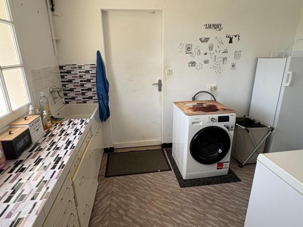 Spacieuse maison avec jardin arboré et double garage