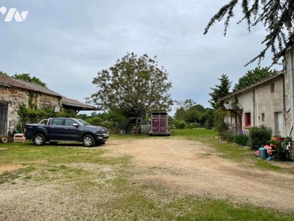 Maison de 184 m² et ses dépendances.