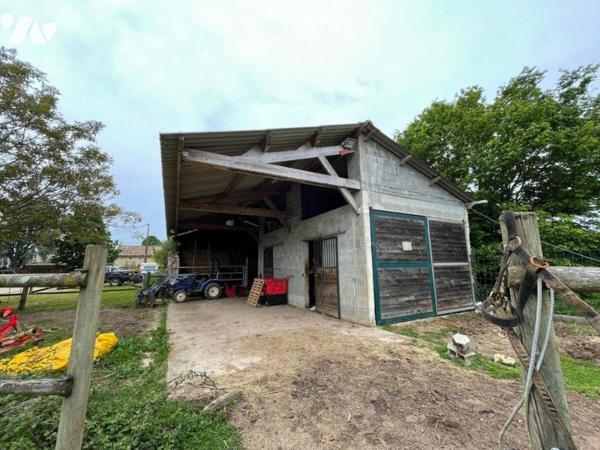 Maison de 184 m² et ses dépendances.