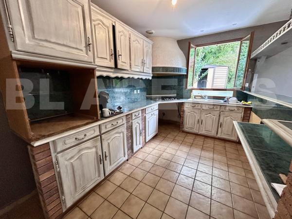 Maison de 115m² sur un terrain de 385m² sur sous sol total.