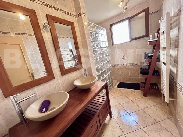 Maison de 115m² sur un terrain de 385m² sur sous sol total.