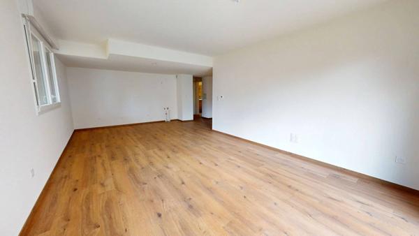 Grand F4 neuf en rez-de-jardin avec 200 m² de jardin et cave