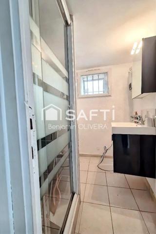 Immeuble avec T2, T2/T3 duplex , local commercial et garage 155m²