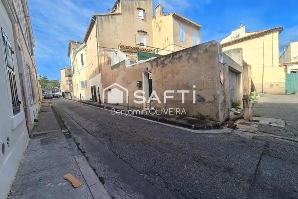 Immeuble avec T2, T2/T3 duplex , local commercial et garage 155m²