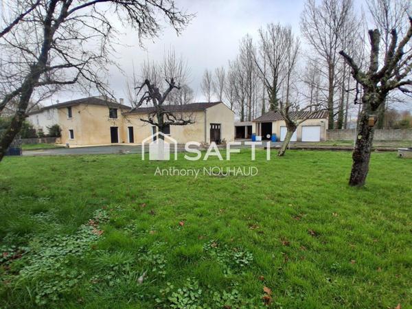 Bien avec 3 chambres, séjour, cuisine, grd garage