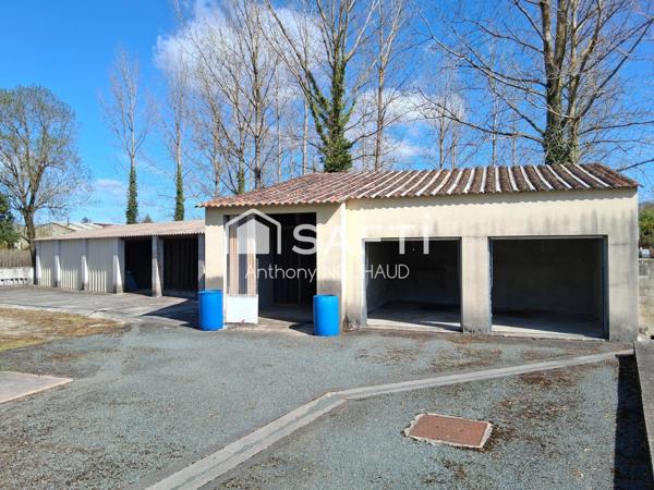 Bien avec 3 chambres, séjour, cuisine, grd garage