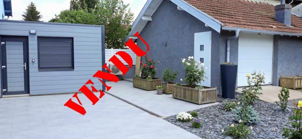 APPARTEMENT de 99 m² avec terrasse et garage.