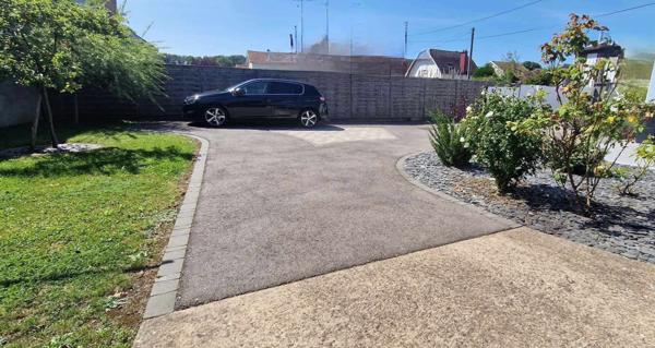 APPARTEMENT de 99 m² avec terrasse et garage.
