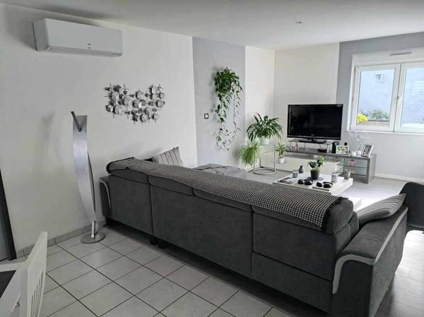 APPARTEMENT de 99 m² avec terrasse et garage.