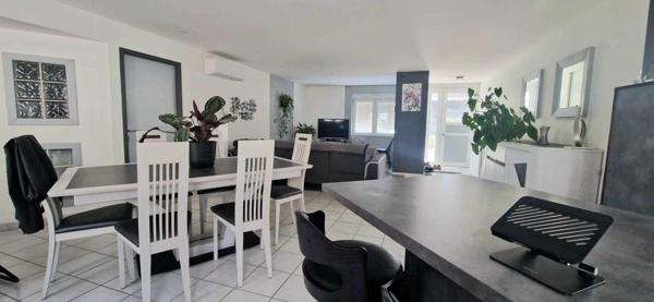 APPARTEMENT de 99 m² avec terrasse et garage.