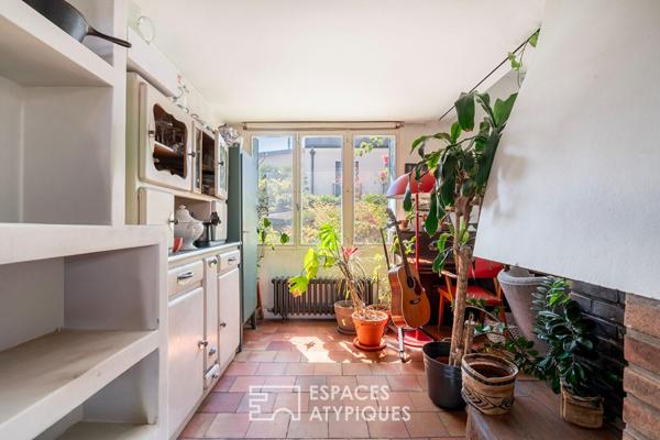 Maison de caractère avec atelier de création et jardin au Charentonneau