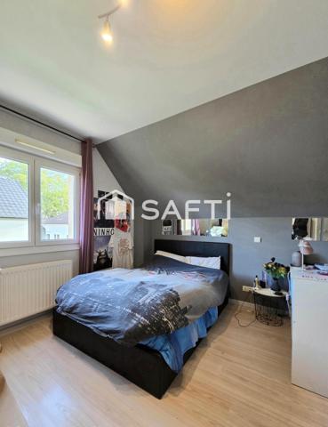À MULHOUSE quartier DORNACH – MAISON FAMILIALE de 2001 de 125 M² – CALME, TERRASSE, JARDIN ET GARAGE DOUBLE