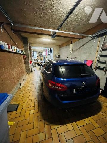 Maison de caractère avec garage 50 m², terrasse et fort potentiel