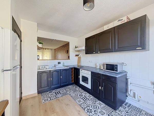 Bel Appartement Centre Meximieux 2 pièce(s) 56.45 m2 avec terrasse et balcon et stationnement couvert