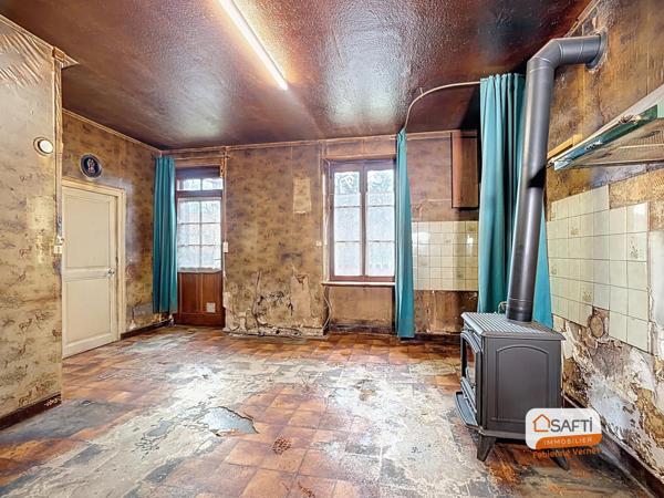 Maison de village à rénover - garage et jardinet