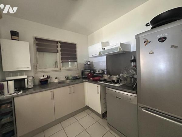 Montélimar, appartement de 49m2 en rez de jardin , parking privatif et cave.