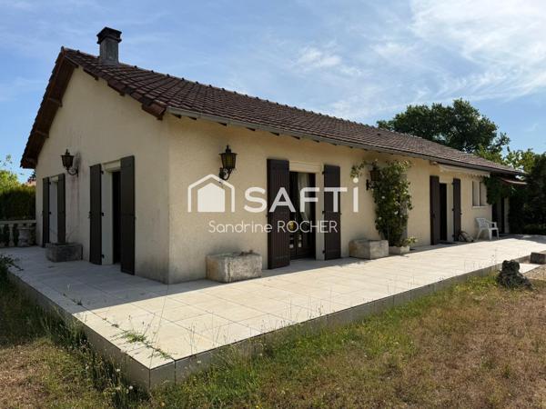 Une maison pleine de potentiel dans un cadre privilégié.