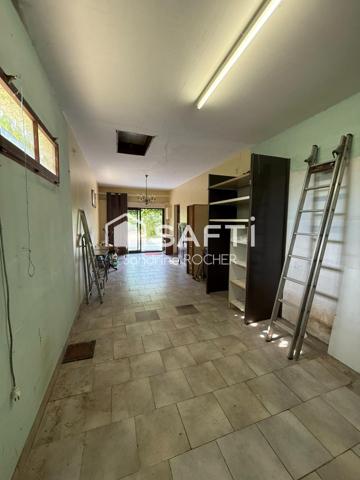 Une maison pleine de potentiel dans un cadre privilégié.