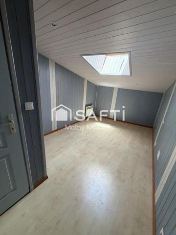 Maison familiale avec 2 garages en centre-ville