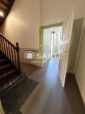 Maison familiale avec 2 garages en centre-ville