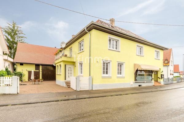 Immeuble mixte 400m² + dépendances sur 20 ares