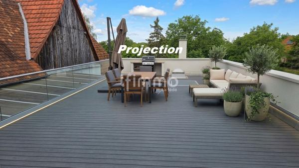 Immeuble mixte 400m² + dépendances sur 20 ares