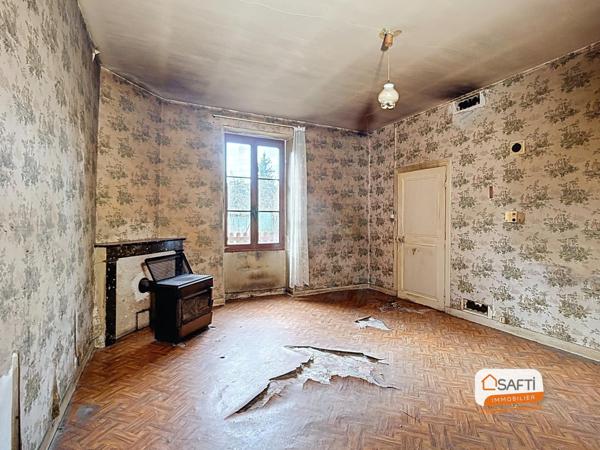 Maison de village à rénover - garage et jardinet