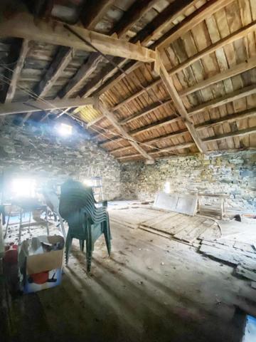 Maison Brassagaise au coeur du village avec double garages et cour interieur