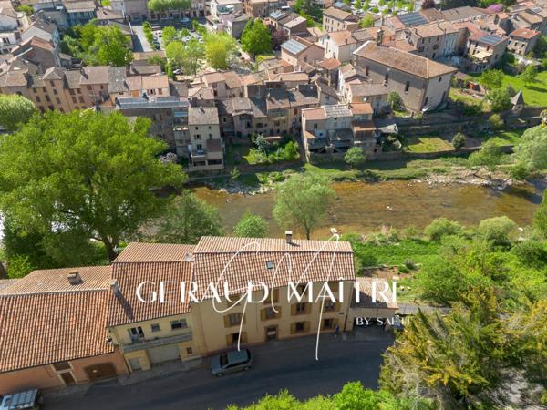 Maison de village 5 ch avec jardin et garage, vue sur la rivière.