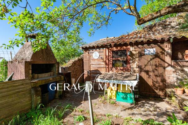 Maison de village 5 ch avec jardin et garage, vue sur la rivière.