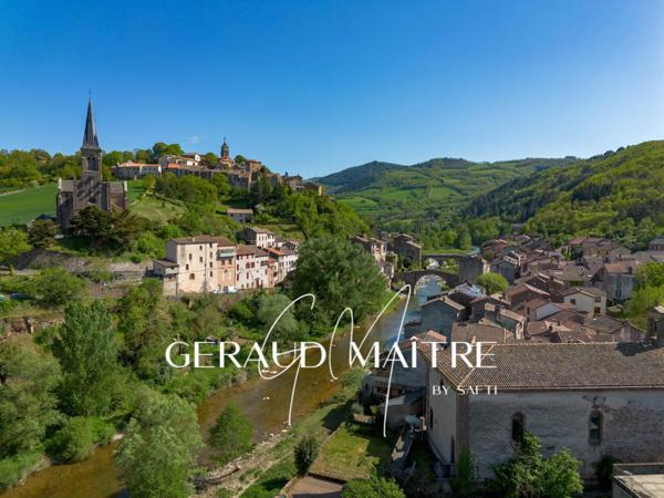 Maison de village 5 ch avec jardin et garage, vue sur la rivière.