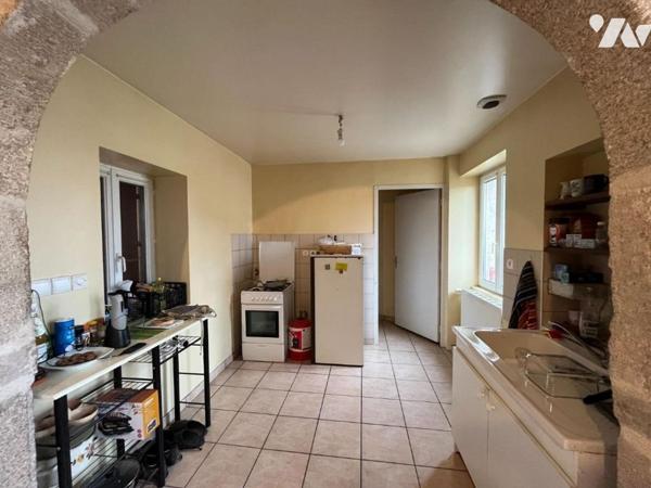 Immeuble de rapport avec deux appartements loués