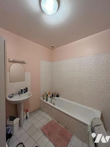 Immeuble de rapport avec deux appartements loués