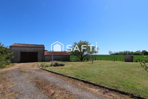 MAISON EN PIERRE AVEC DÉPENDANCES ET TERRAIN