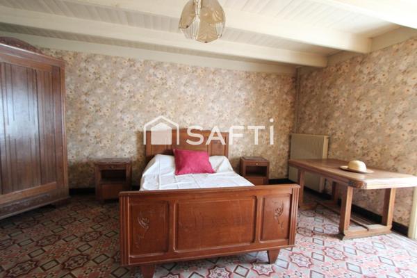 MAISON EN PIERRE AVEC DÉPENDANCES ET TERRAIN