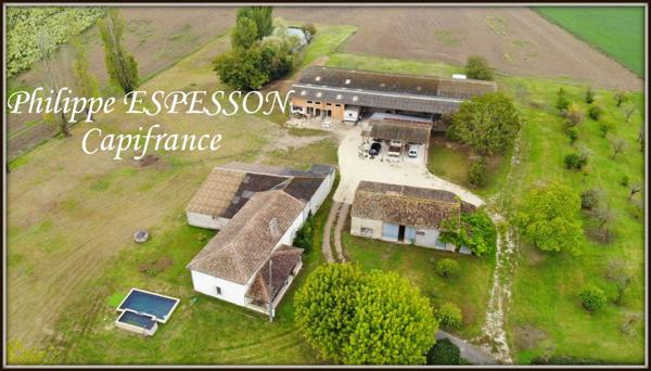 CORPS DE FERME EN PIERRE SUR UN PARC DE 14000 M2 SUR LEVIGNAC DE GUYENNE (47)